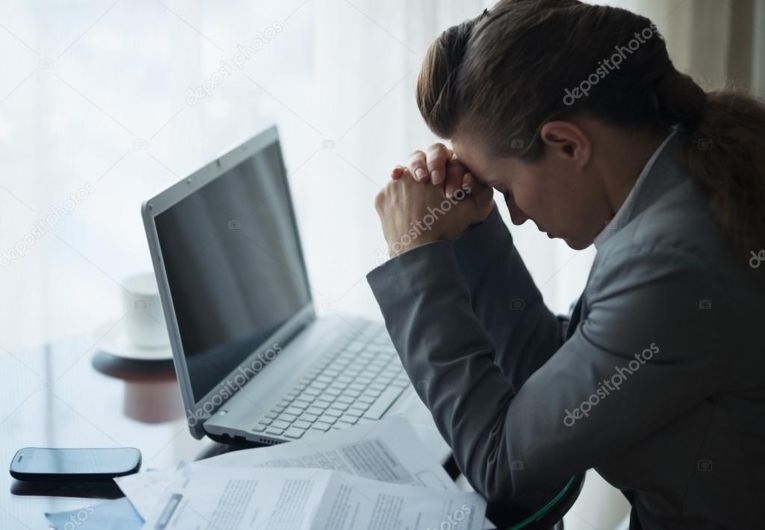 stressed business woman working sitting